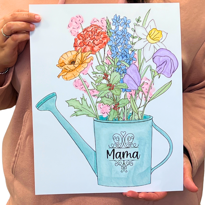 A woman holding our watercolor-style art print featuring a watering can filled with birth month flowers, personalized for Mom. A thoughtful gift for Mother's Day or any special occasion, showcasing children or grandchildren's unique birth flowers.