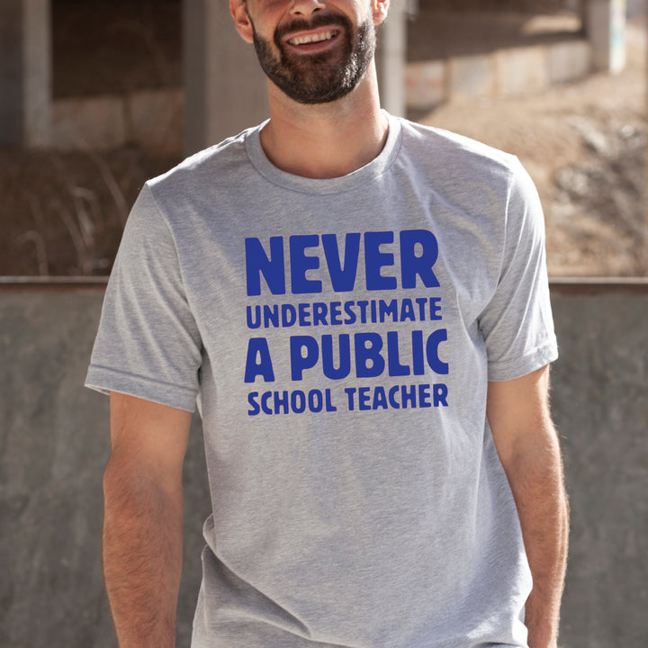 Never Underestimate a Public School Teacher| Adult Unisex Short Sleeve Tee | Election 2024